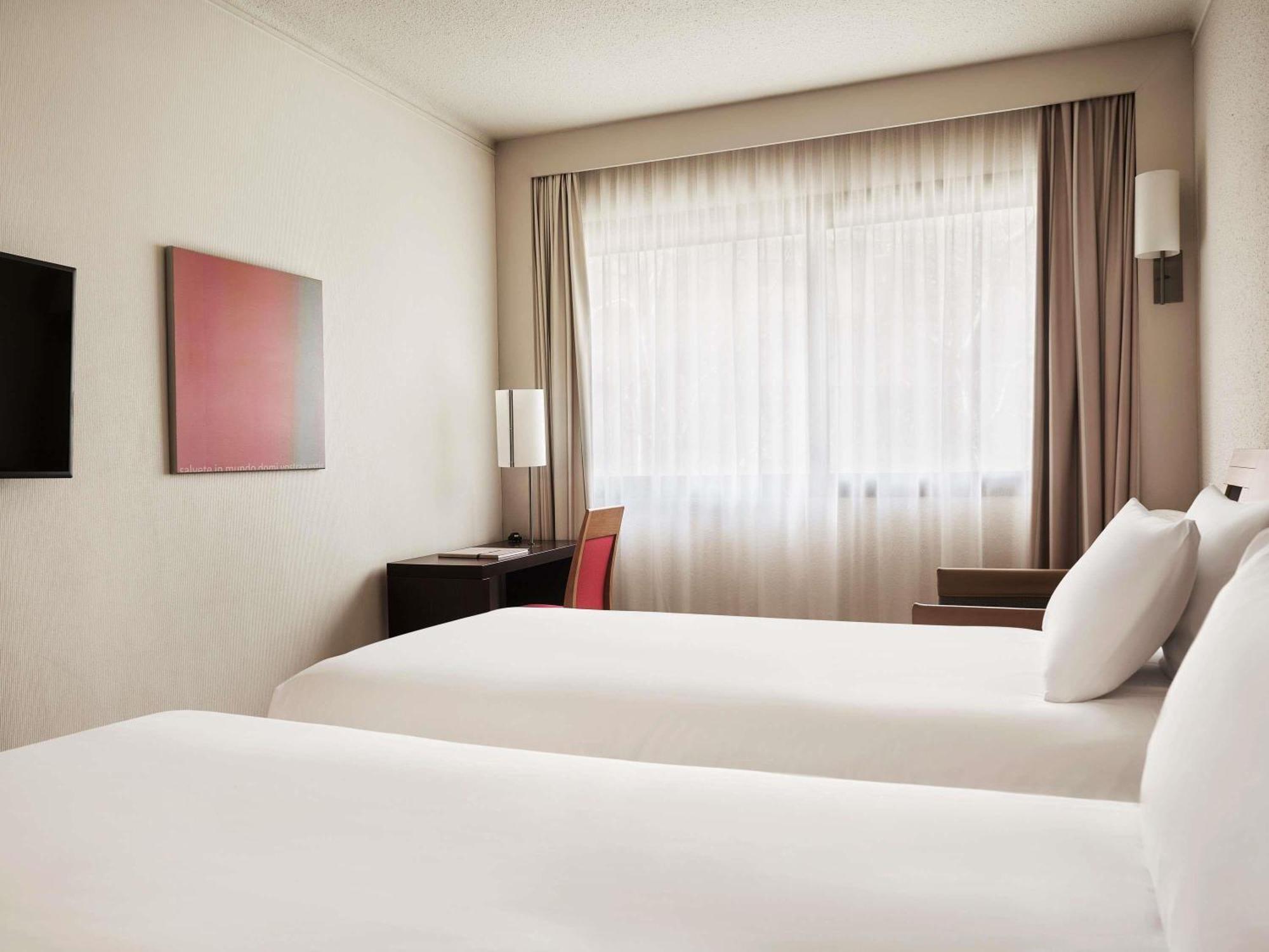 Standard Twin Room 2 single beds 1 single sofa bed